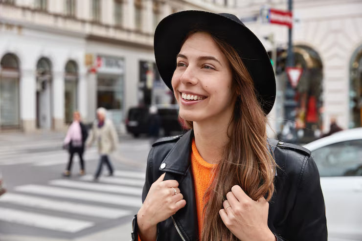 files/delighted-female-tourist-has-glad-expression-has-toothy-smile-with-white-teeth-excursion-city_273609-25786.avif